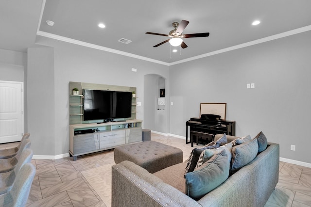 306 N Pendell Ave, Cleburne, TX 76033 - living area with arched walkways, ceiling fan, baseboards, crown molding, and recessed lighting