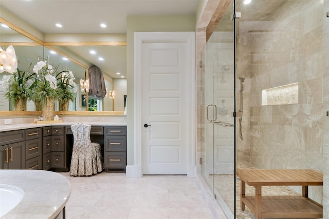 303 Steeplechase Dr, Irving, TX 75062 - bathroom featuring a shower stall, vanity, and recessed lighting