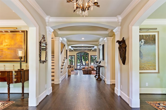 303 Steeplechase Dr, Irving, TX 75062 - foyer with arched walkways, dark wood-style flooring, a chandelier, decorative columns, and crown molding