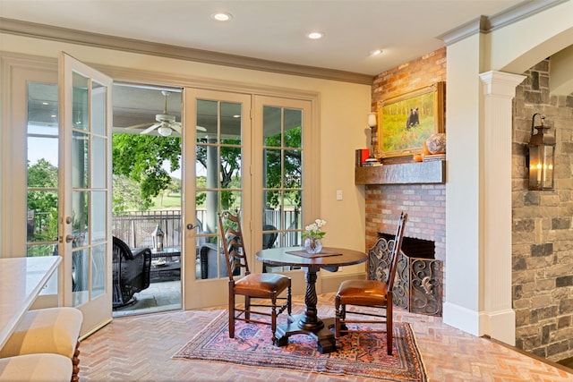 303 Steeplechase Dr, Irving, TX 75062 - dining area featuring ceiling fan, french doors, a fireplace, ornamental molding, and recessed lighting