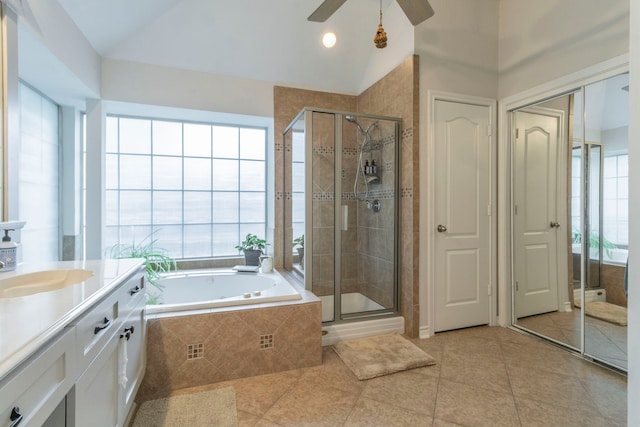 5428 Lake Powell Dr, Fort Worth, TX 76137 - bathroom featuring tile patterned floors, a shower stall, a ceiling fan, a bath, and vanity