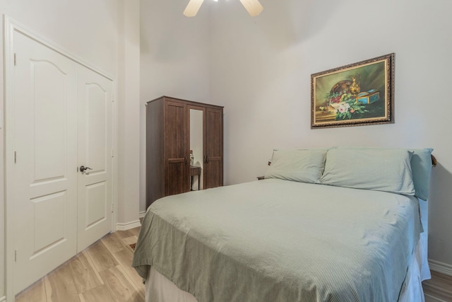 5428 Lake Powell Dr, Fort Worth, TX 76137 - bedroom featuring light wood-type flooring, a high ceiling, baseboards, and ceiling fan
