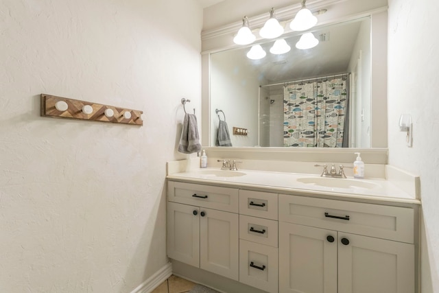 5428 Lake Powell Dr, Fort Worth, TX 76137 - full bathroom with double vanity, a shower with shower curtain, and tile patterned floors