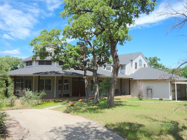10080 Arvin Hill Rd, Aubrey, TX 76227 - view of front of house featuring a front lawn, an attached garage, and roof with shingles