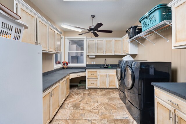 10080 Arvin Hill Rd, Aubrey, TX 76227 - clothes washing area featuring cabinet space, washing machine and dryer, light stone finish floors, and a ceiling fan