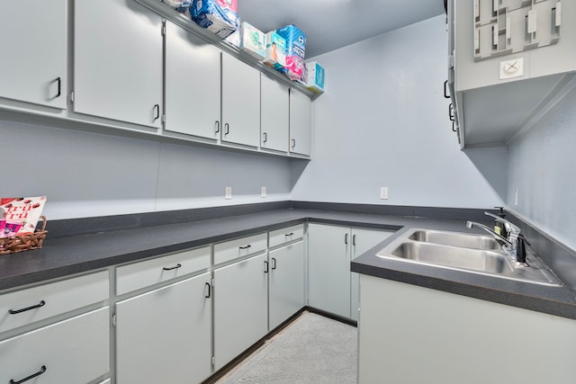 10080 Arvin Hill Rd, Aubrey, TX 76227 - kitchen with a sink, dark countertops, and white cabinetry