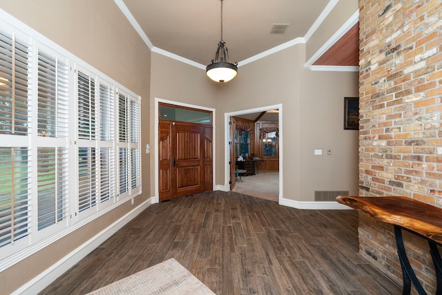 10080 Arvin Hill Rd, Aubrey, TX 76227 - entryway featuring dark wood-type flooring, baseboards, and ornamental molding