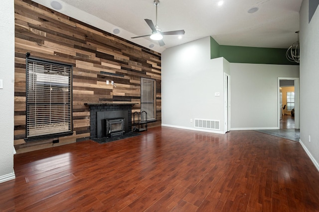 foyer featuring dark tile patterned floors and baseboards