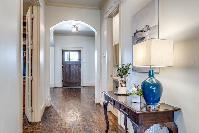 3728 Stanford Ave, University Park, TX 75225 - foyer entrance with arched walkways, wood finished floors, ornamental molding, and baseboards