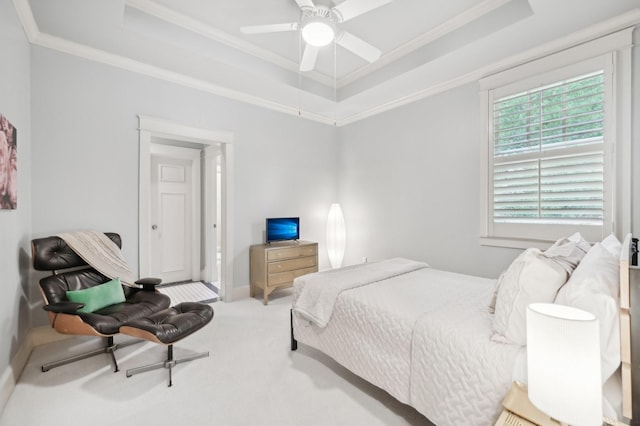 3728 Stanford Ave, University Park, TX 75225 - carpeted bedroom with a tray ceiling, ornamental molding, and a ceiling fan