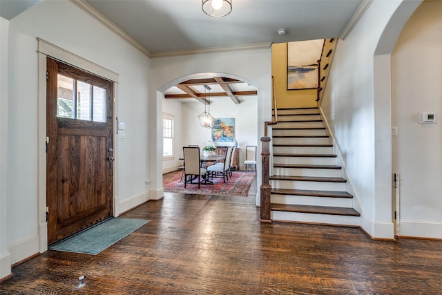 3728 Stanford Ave, University Park, TX 75225 - foyer entrance featuring arched walkways, wood finished floors, ornamental molding, baseboards, and coffered ceiling