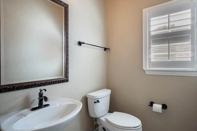 3704 Southport Dr, Plano, TX 75025 - bathroom featuring a sink and toilet