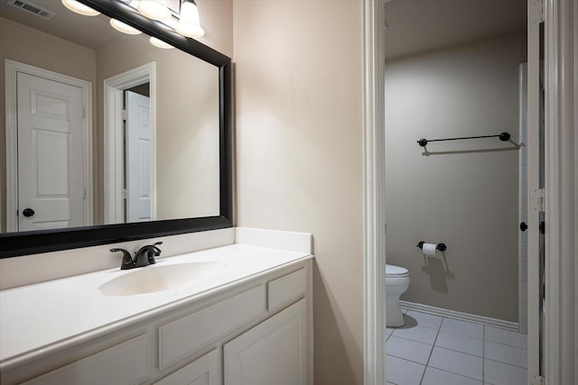 3704 Southport Dr, Plano, TX 75025 - bathroom with toilet, tile patterned floors, vanity, and baseboards