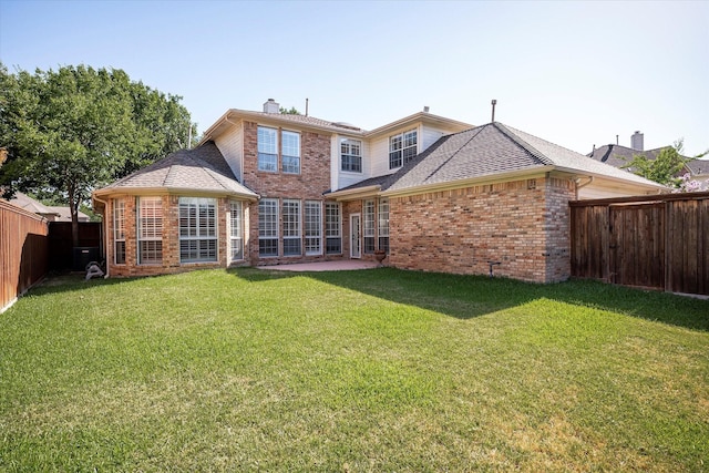 3704 Southport Dr, Plano, TX 75025 - rear view of property featuring brick siding, roof with shingles, a chimney, and a patio
