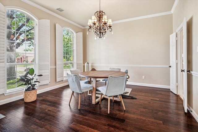 3704 Southport Dr, Plano, TX 75025 - dining area with a chandelier, dark wood finished floors, ornamental molding, and baseboards