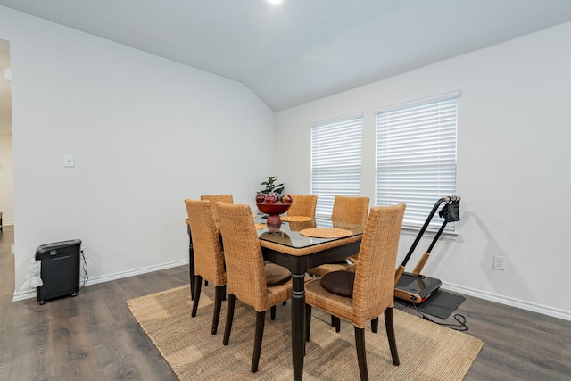2308 Bellewood Ct, Crandall, TX 75114 - dining space featuring lofted ceiling, wood finished floors, and baseboards