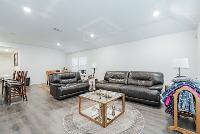 2308 Bellewood Ct, Crandall, TX 75114 - living area with lofted ceiling, wood finished floors, and recessed lighting