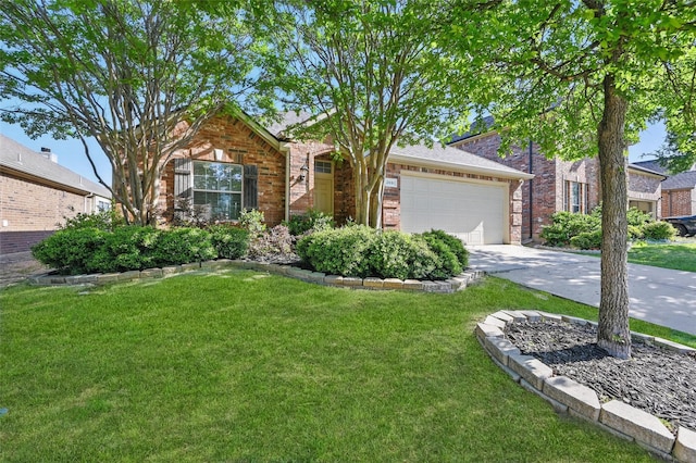 2691 Waterdance Dr, Little Elm, TX 75068 - view of front of home with an attached garage, driveway, and a front lawn
