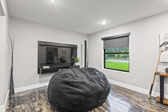 2512 Bennett Ave, Sherman, TX 75090 - living area with baseboards, wood finished floors, and recessed lighting