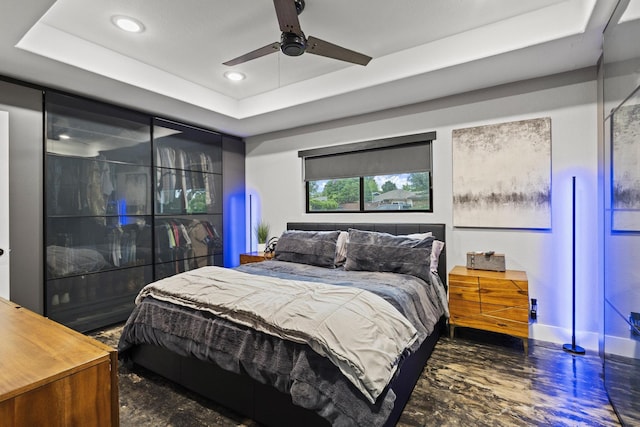 2512 Bennett Ave, Sherman, TX 75090 - bedroom featuring recessed lighting, ceiling fan, a raised ceiling, and baseboards