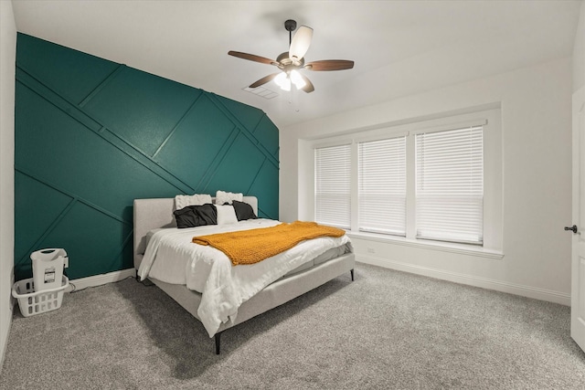2643 Perdenales Dr, Royse City, TX 75189 - bedroom featuring carpet floors, a decorative wall, baseboards, and a ceiling fan
