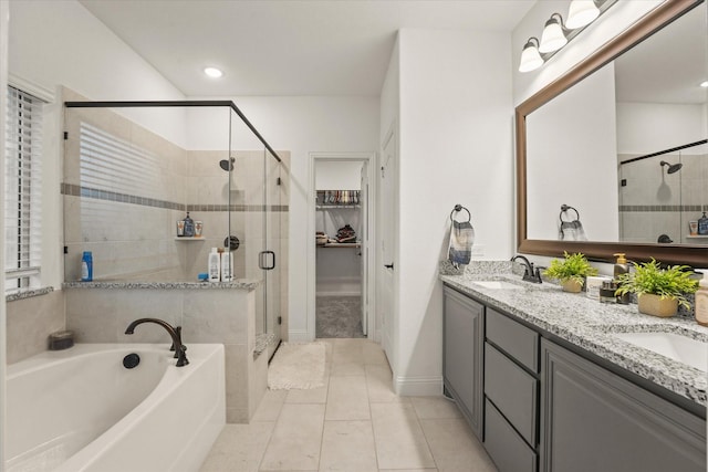 2643 Perdenales Dr, Royse City, TX 75189 - bathroom with a shower stall, a garden tub, double vanity, and tile patterned flooring