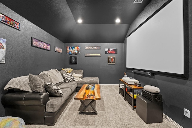 2643 Perdenales Dr, Royse City, TX 75189 - home theater room featuring carpet, vaulted ceiling, a textured wall, and baseboards