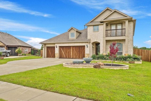 2643 Perdenales Dr, Royse City, TX 75189 - view of front facade featuring a balcony, concrete driveway, a garage, and roof with shingles