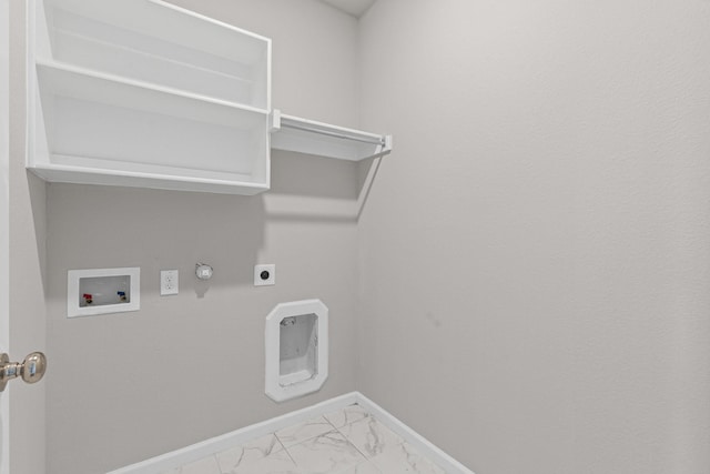 laundry room featuring baseboards, gas dryer hookup, washer hookup, marble look tiles, and electric dryer hookup