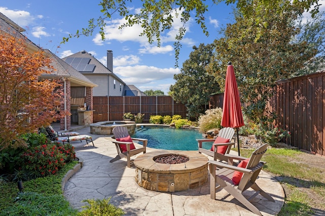 850 Long Valley Ct, Prosper, TX 75078 - view of swimming pool featuring an outdoor fire pit, a fenced backyard, a patio area, and a pool with connected hot tub
