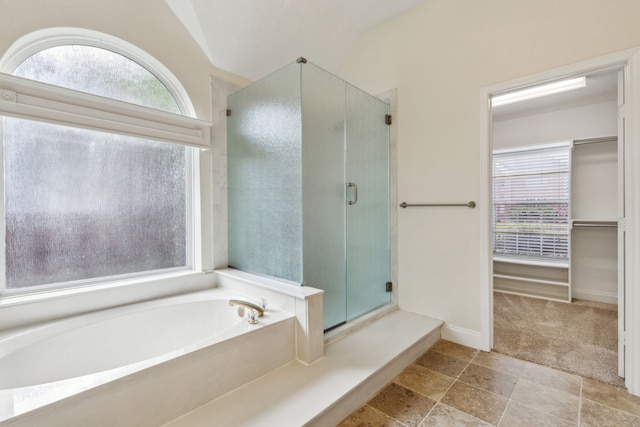 10008 Preston Vineyard Dr, Frisco, TX 75035 - full bathroom with a shower stall, a bath, and vaulted ceiling