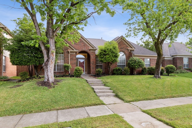 10008 Preston Vineyard Dr, Frisco, TX 75035 - traditional home with brick siding, a front lawn, and a shingled roof