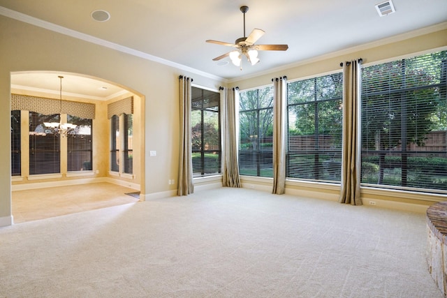 1727 Lantana Ln, Frisco, TX 75033 - unfurnished room featuring carpet, ornamental molding, arched walkways, a chandelier, and ceiling fan