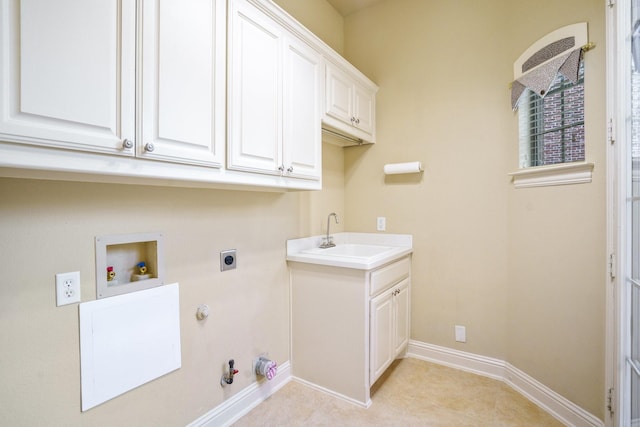 1727 Lantana Ln, Frisco, TX 75033 - laundry area featuring gas dryer hookup, hookup for an electric dryer, baseboards, and cabinet space