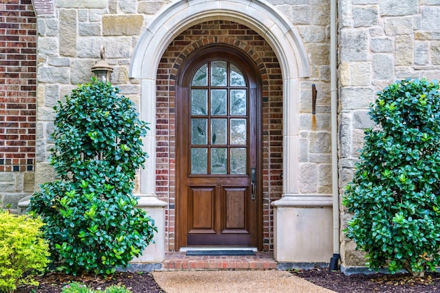 1727 Lantana Ln, Frisco, TX 75033 - doorway to property featuring stone siding and brick siding