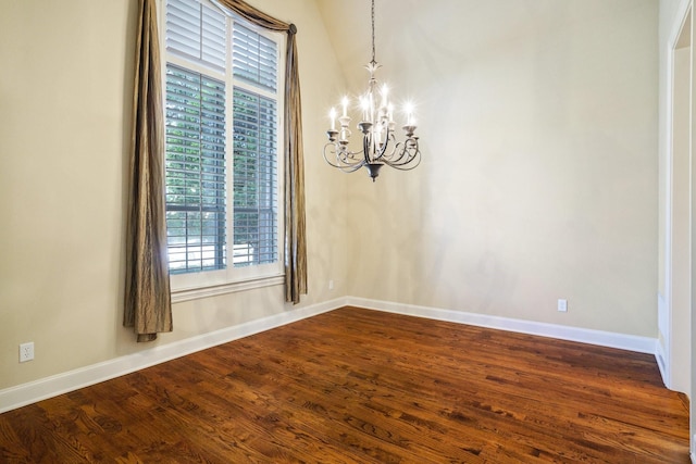 1727 Lantana Ln, Frisco, TX 75033 - unfurnished dining area with a chandelier, healthy amount of natural light, dark wood finished floors, and baseboards