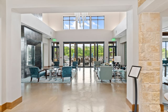 common area with a towering ceiling