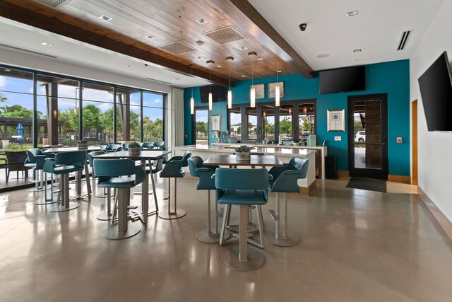lobby with beam ceiling and wooden ceiling
