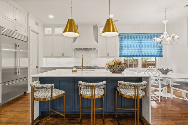 3428 Stanford Ave, University Park, TX 75225 - kitchen with stainless steel built in fridge, custom exhaust hood, white cabinetry, a chandelier, and recessed lighting