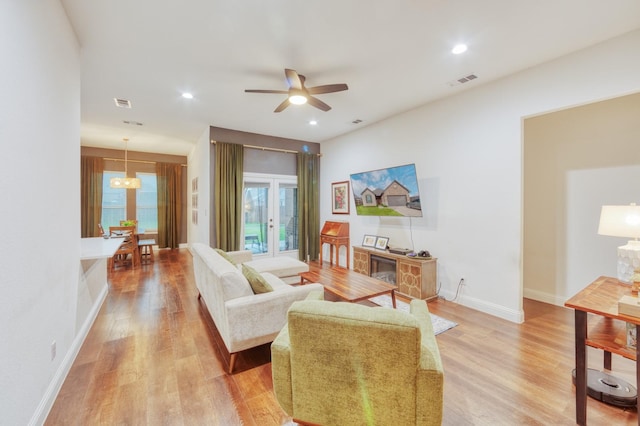 522 N Montague St, Pilot Point, TX 76258 - living area with light wood-type flooring, a ceiling fan, baseboards, and recessed lighting