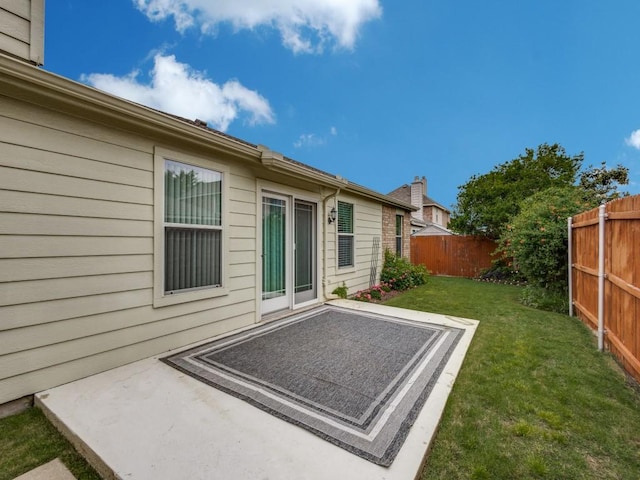 rear view of house with a patio