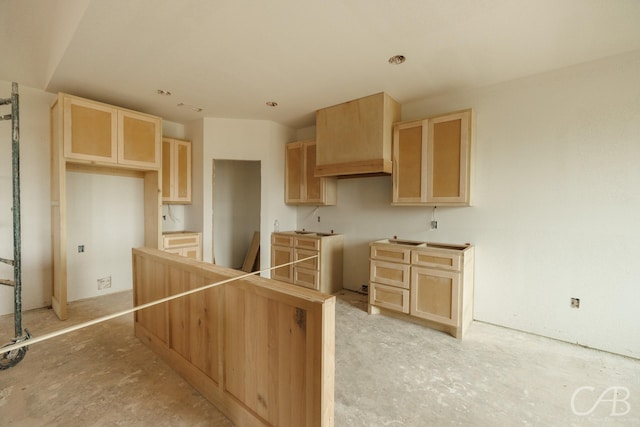 7507 Salerno Ct, Abilene, TX 79606 - kitchen with light brown cabinets and a kitchen island