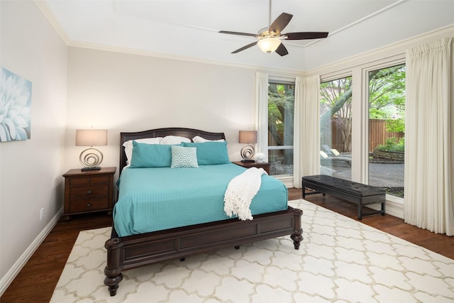 bedroom featuring access to outside, dark wood finished floors, baseboards, ceiling fan, and ornamental molding