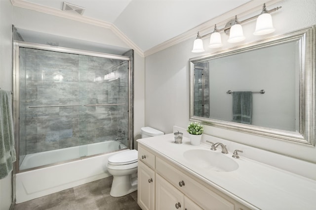 bathroom featuring toilet, vanity, combined bath / shower with glass door, vaulted ceiling, and crown molding