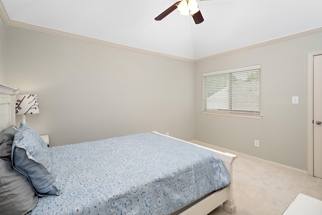 bedroom featuring lofted ceiling, carpet, baseboards, crown molding, and a ceiling fan
