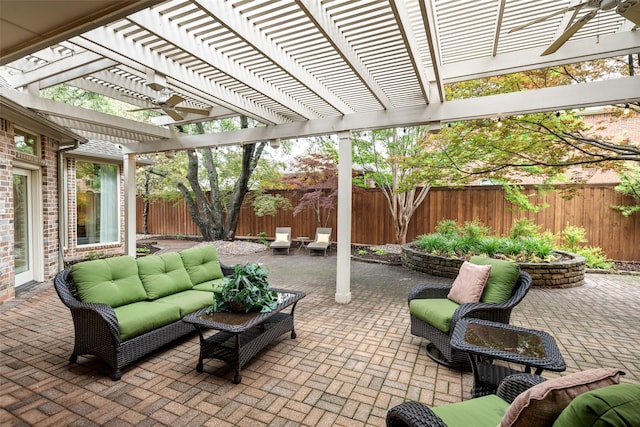 view of patio / terrace featuring a fenced backyard, a pergola, an outdoor living space, and ceiling fan