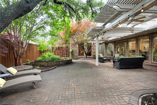 view of patio / terrace with a pergola and a fenced backyard