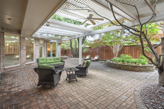 view of patio featuring a pergola, a fenced backyard, an outdoor hangout area, and ceiling fan