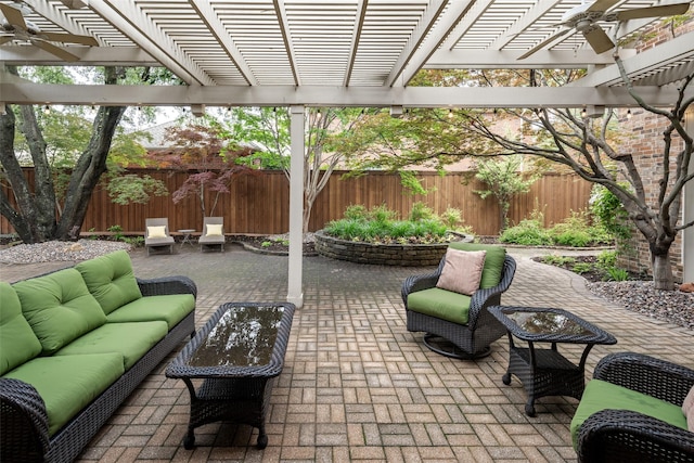 view of patio / terrace featuring outdoor lounge area, a fenced backyard, a pergola, and ceiling fan