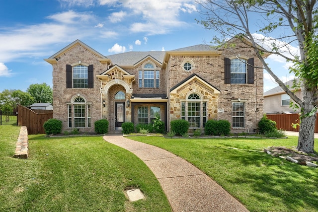 view of front of property featuring brick siding